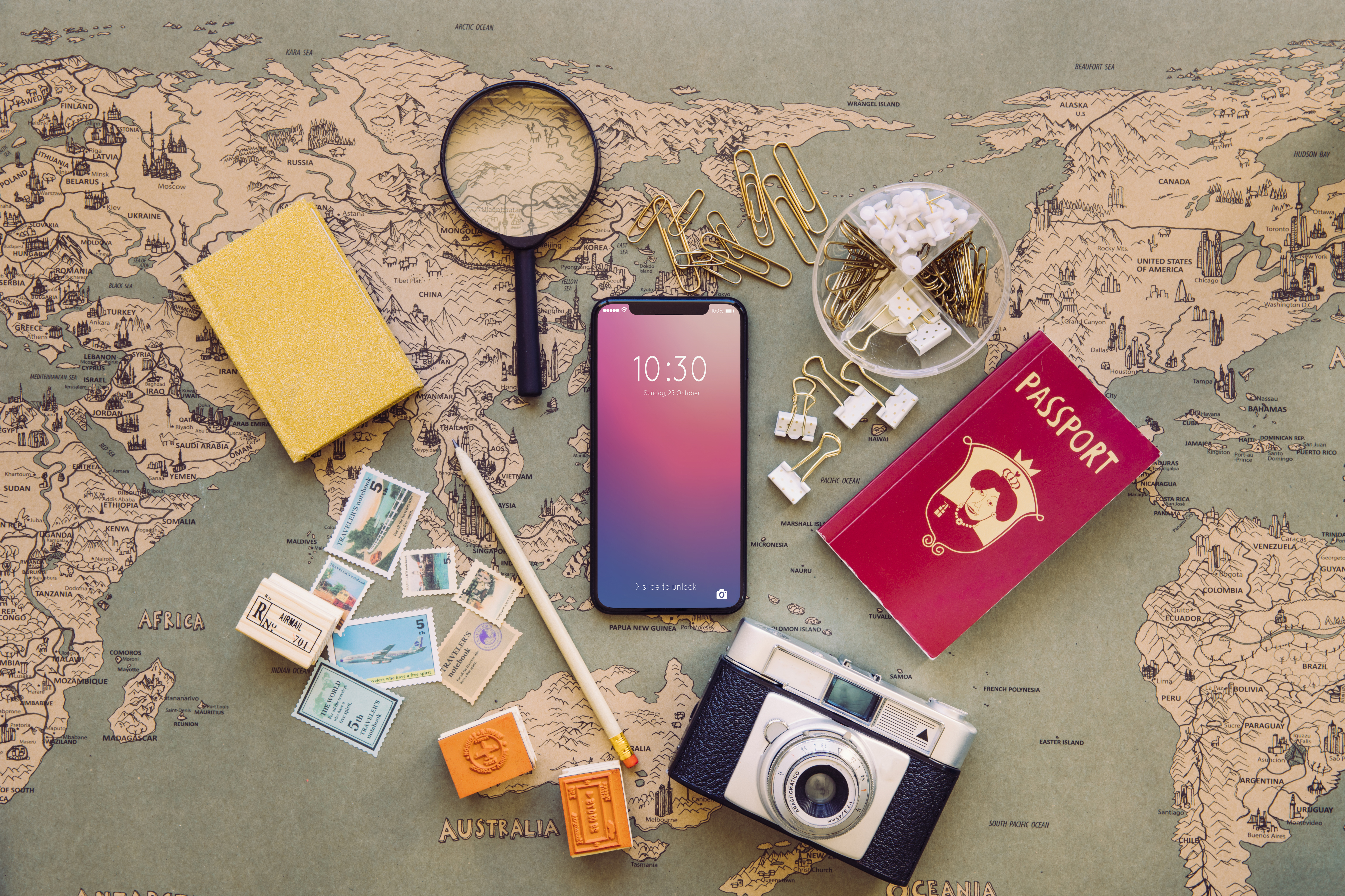 Flat lay of passport, smartphone, and travel items symbolizing Roamvy eSIM customer support for global travelers